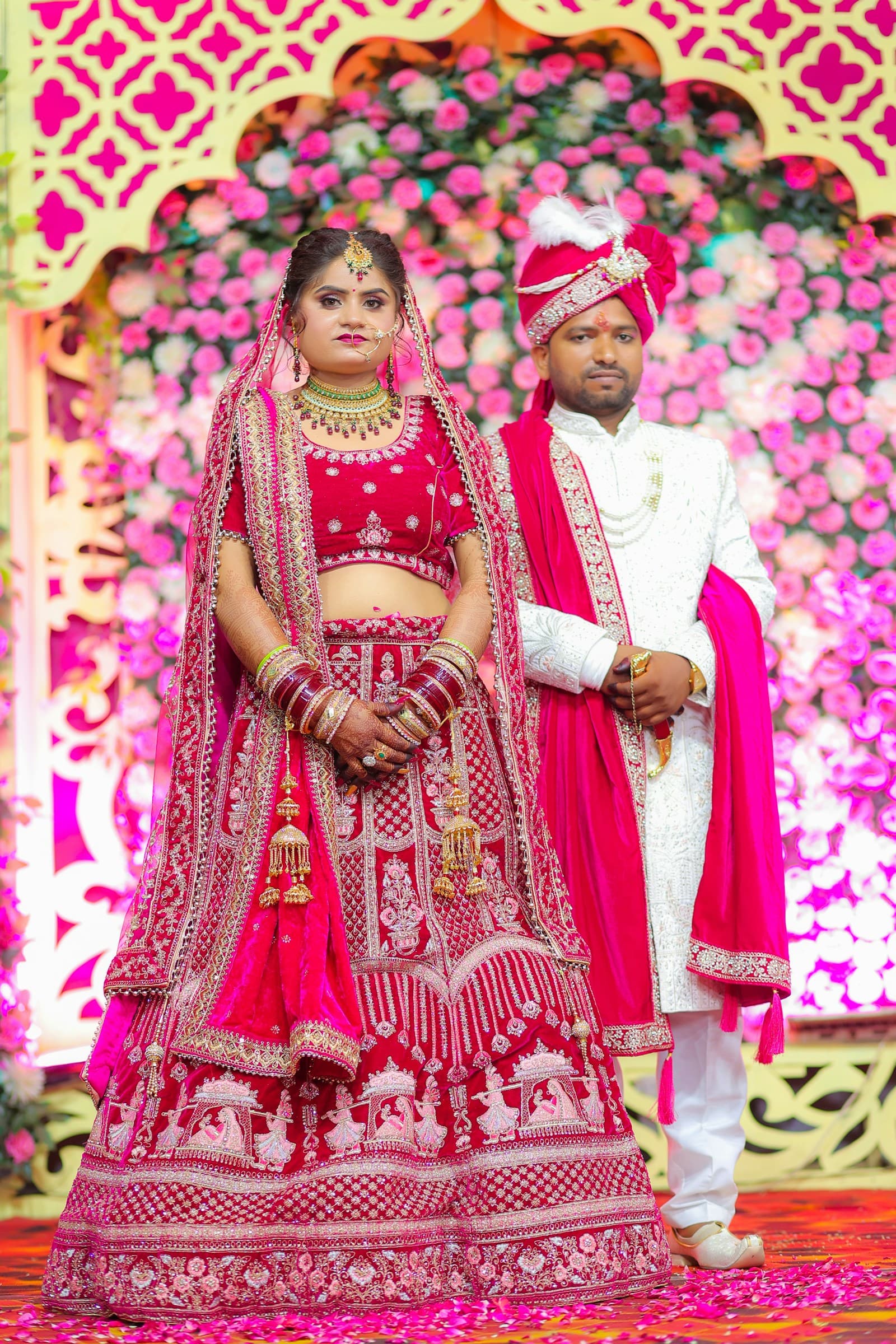 Indian wedding couple photographed in traditional attire